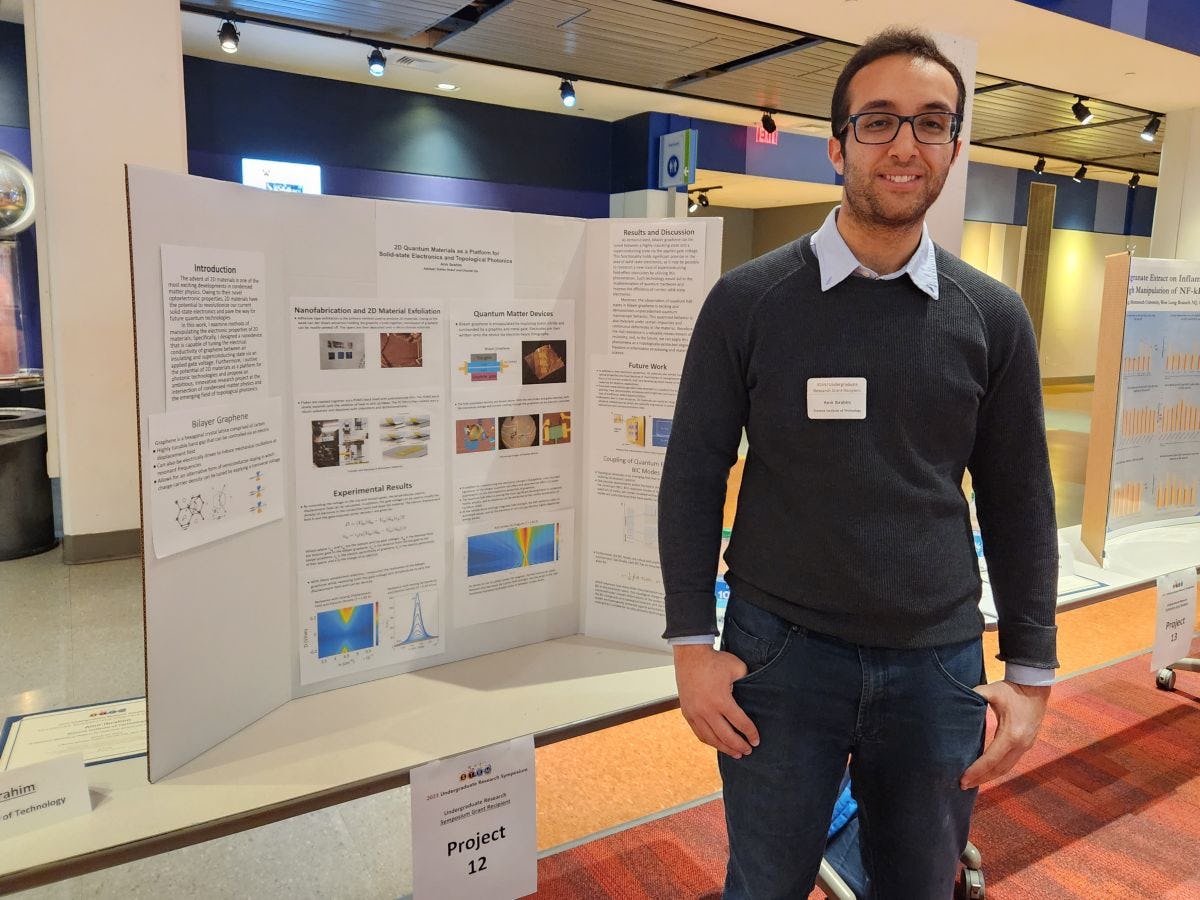 Amir Ibrahim ’25 with his research poster at ICUNJ 2023