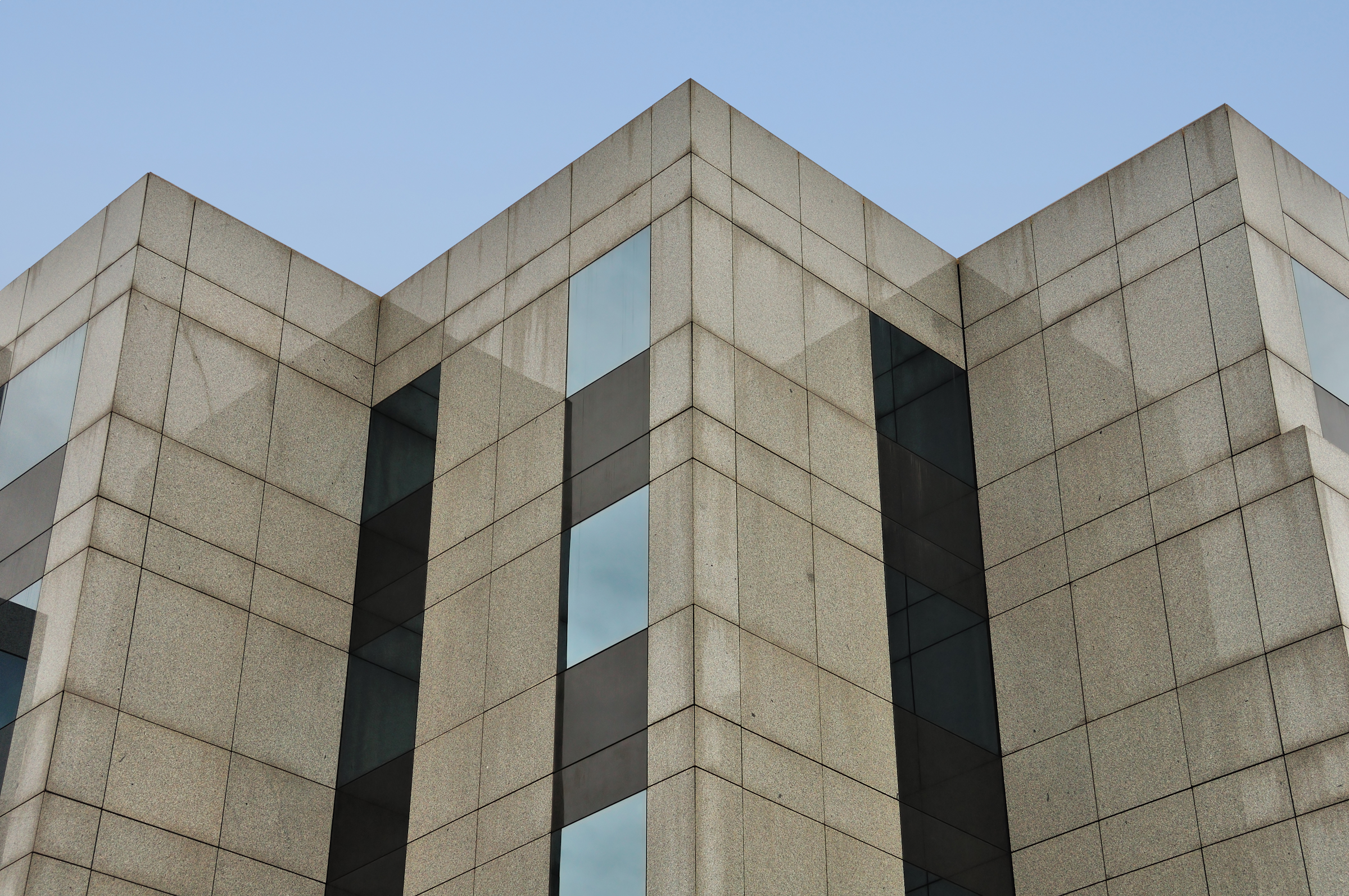 Photo of corners of a multi-story building 