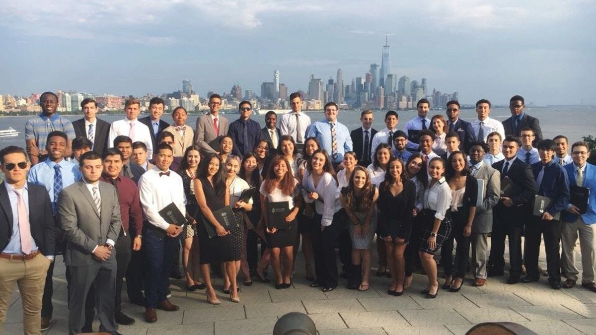 Members of the Class of 2021 who participated in the 2017 STEP Bridge Summer Program gather for a picture at Castle Point Lookout with lower Manhattan as a backdrop