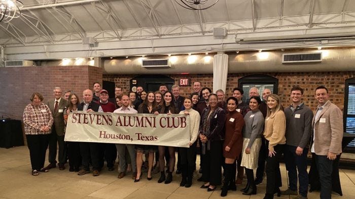 Alumni gather at the Houston Alumni Network Holiday Party in 2022