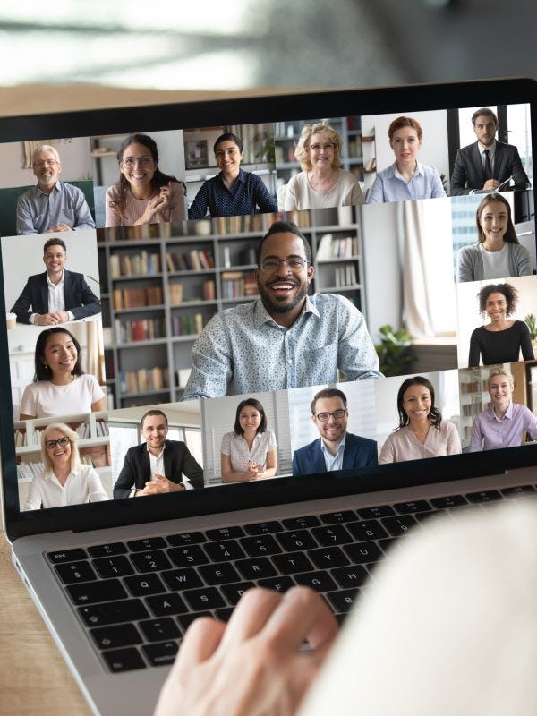 Computer screen with multiple faces hosting a chat