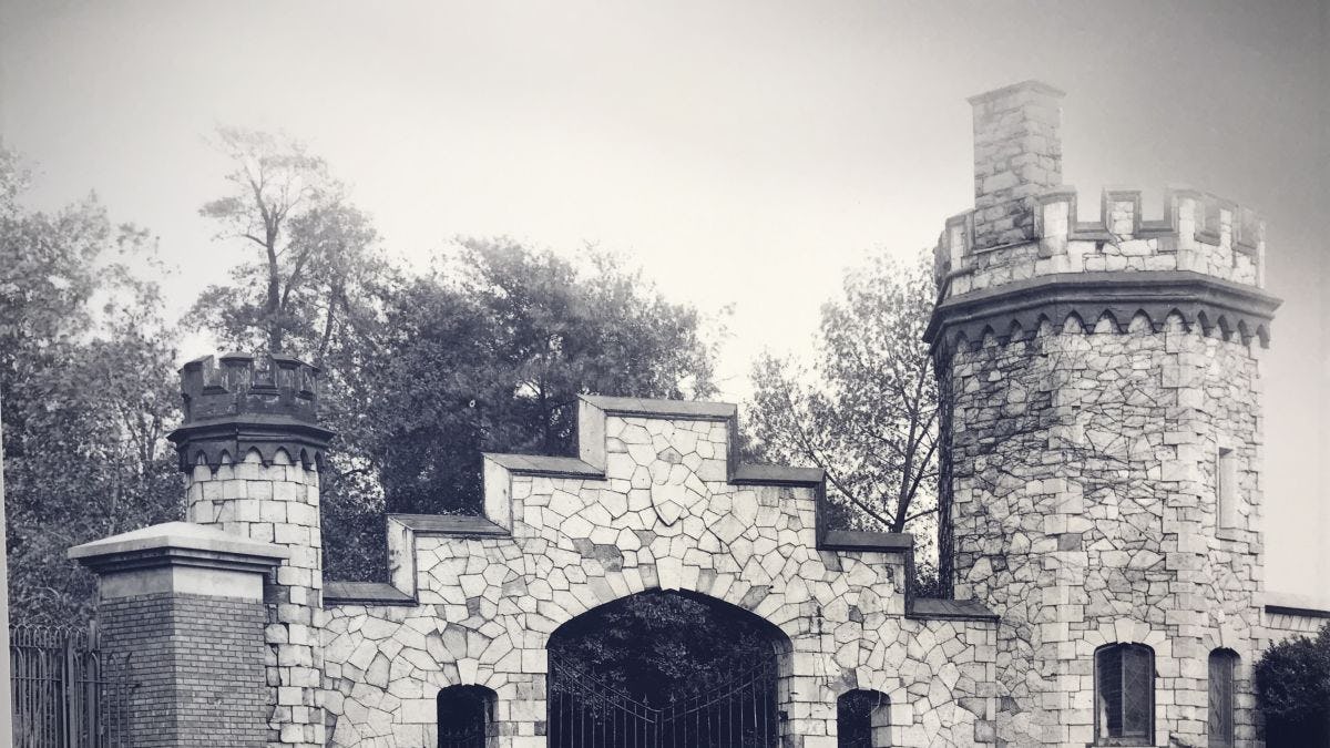 A vintage black and white photo of the gatehouse at Stevens Institute of Technology