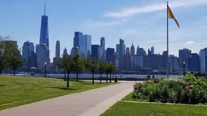 View of American flag and One World Trade from Liberty State Park 