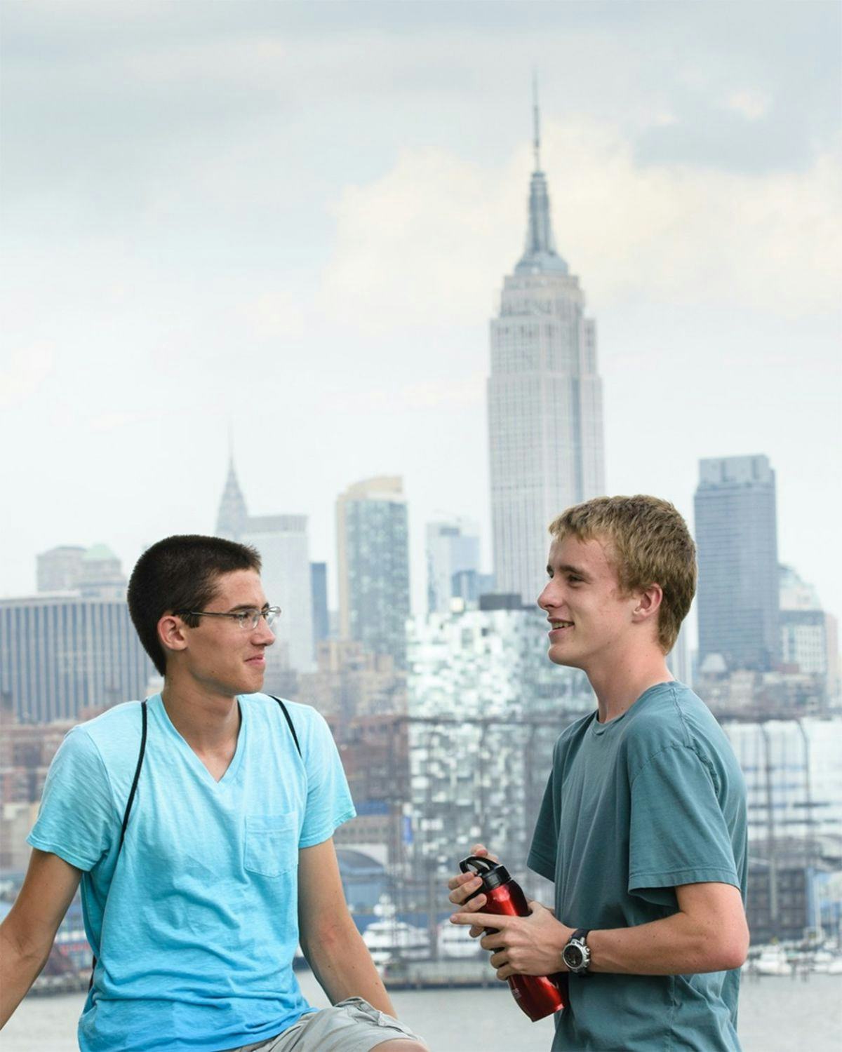 Students standing in front of the Empire State Building