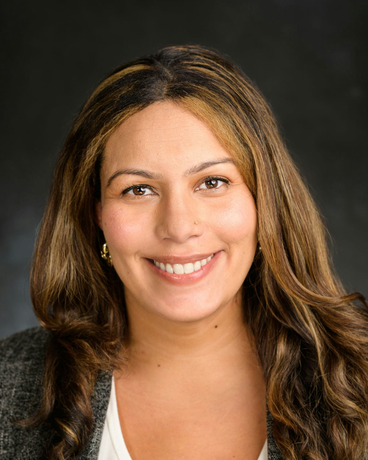 A headshot of Karla Medina, our Senior Director of Marketing