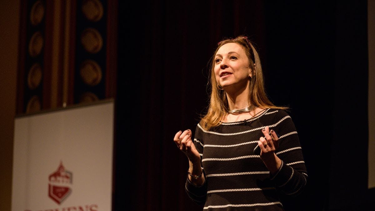 Susan Cain on stage facing an audience in DeBaun Auditorium at Stevens Institute of Technology