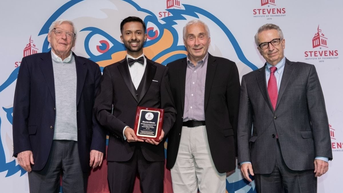 Shardul Shinde receives the Oustanding Leadership and Service Award at the 2022 awards gala. 
