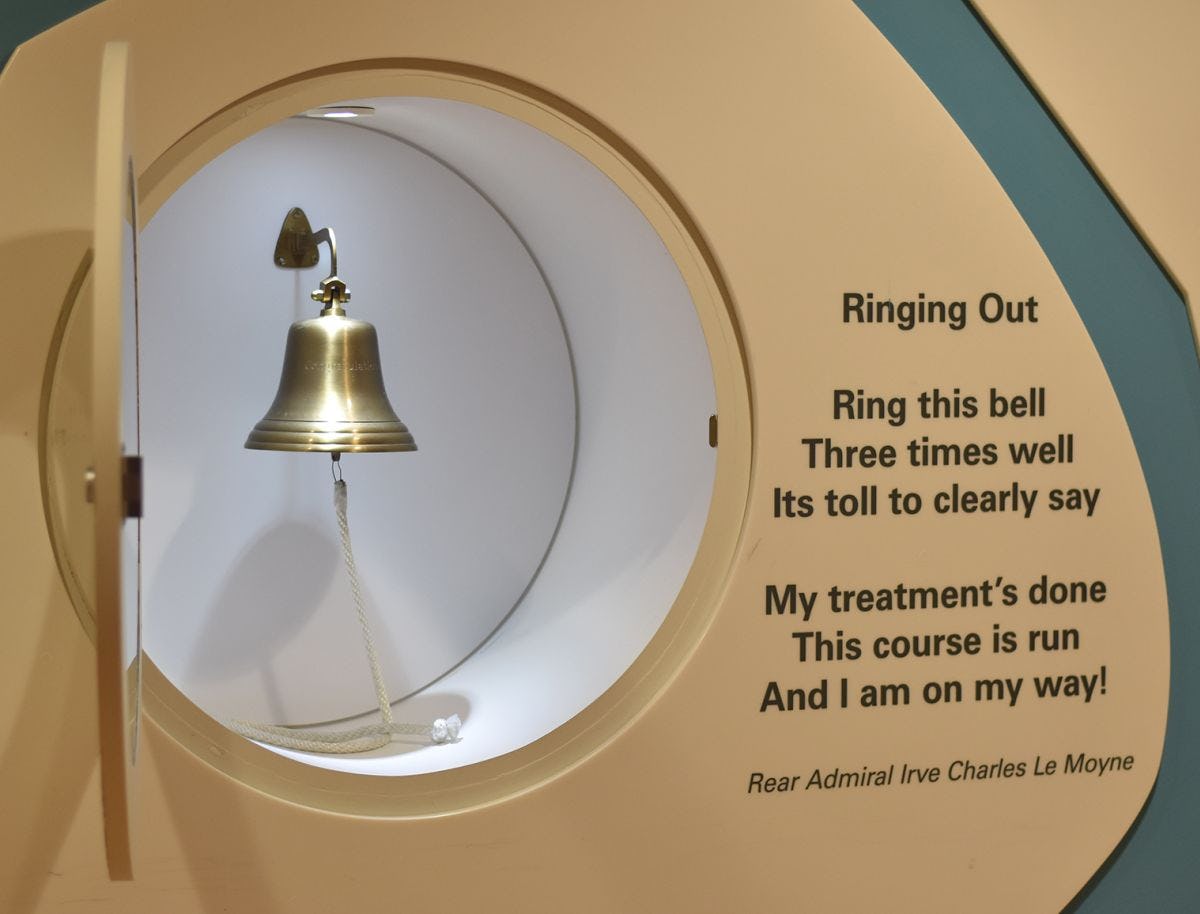 Bell inset into wall with poem: Ringing Out, Ring this bell Three times well It's toll to clearly say My treatment's done This course is run And I'm on my way!