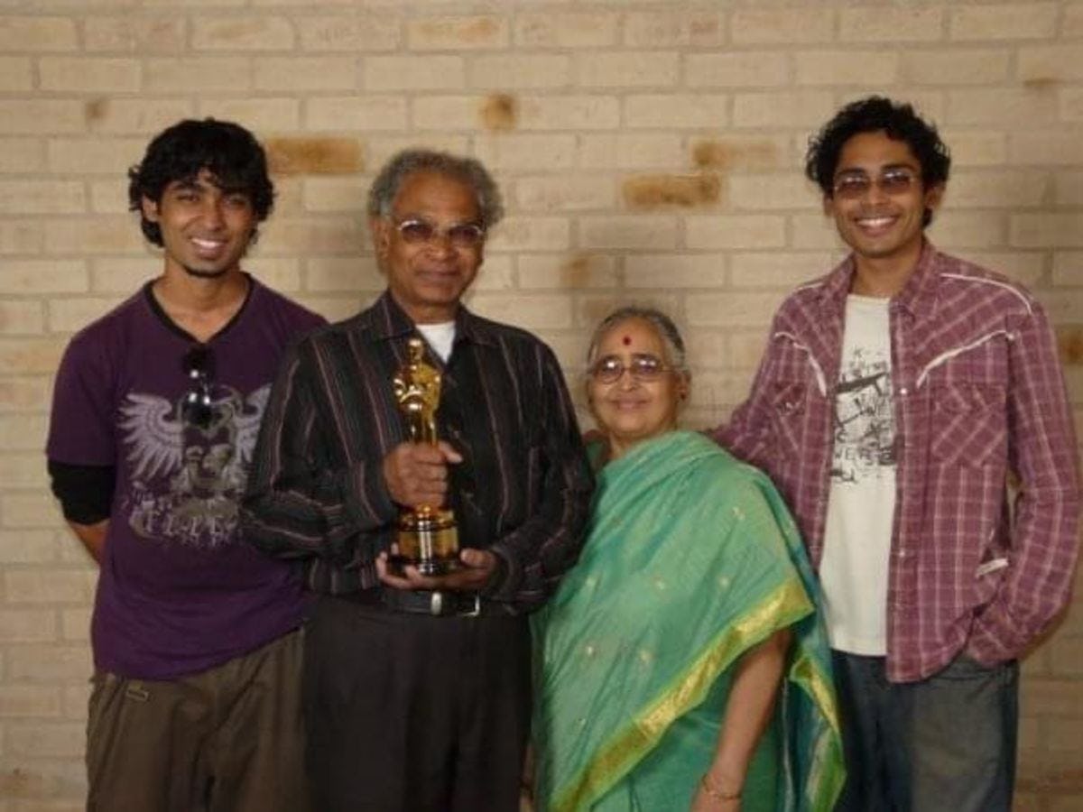 Satish Goda poses with family