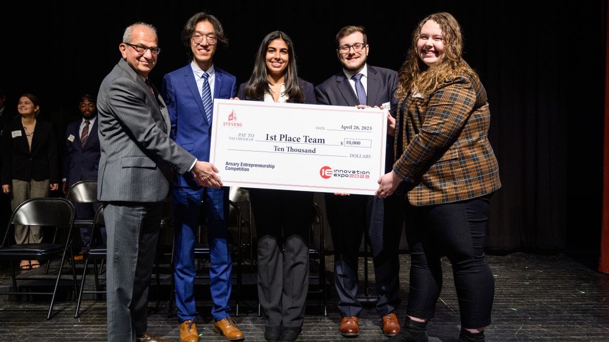 The victorious Maritime Security team poses with Stevens President Nariman Farvardin following the 2023 Ansary Entrepreneurship Competition. From left to right next to Farvardin: Dehan Kong, Reva Grover, Daniel Wadler and Samantha Weckesser. 