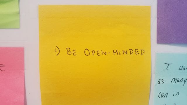 Post-It note showing Be open-minded