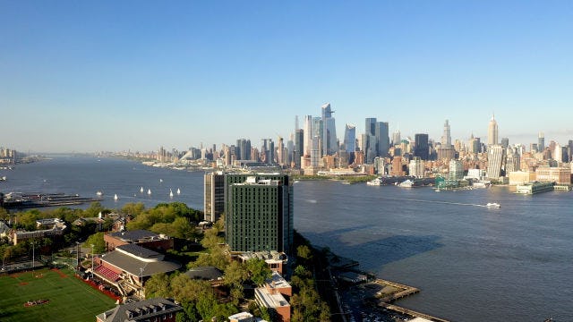 arial view of campus and Hudson River
