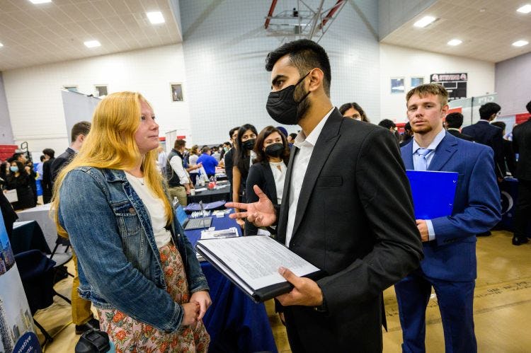 Employer with Student at Fall 2022 Career Fair 
