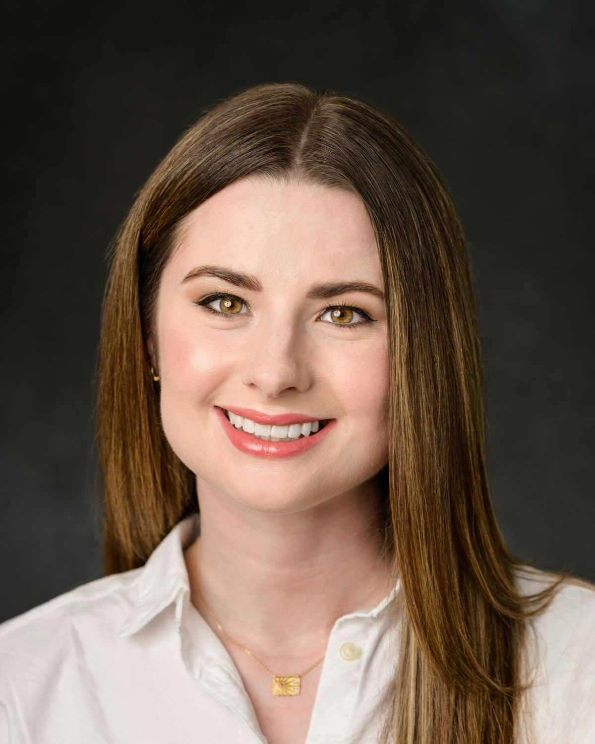 A headshot of Erin Lewis, our Managing Editor