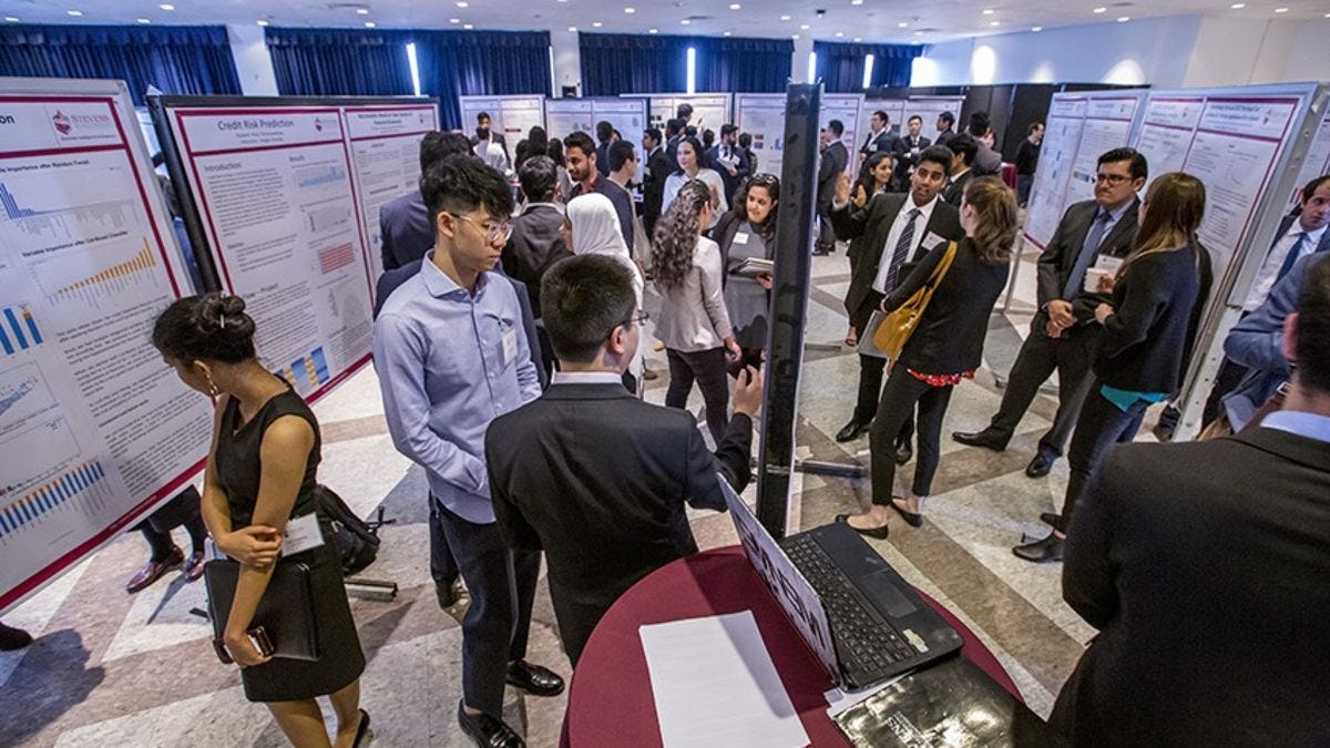 Students in the Stevens Business Intelligence and Analytics program showcase their research projects to industry and academic attendees at a recent networking event.