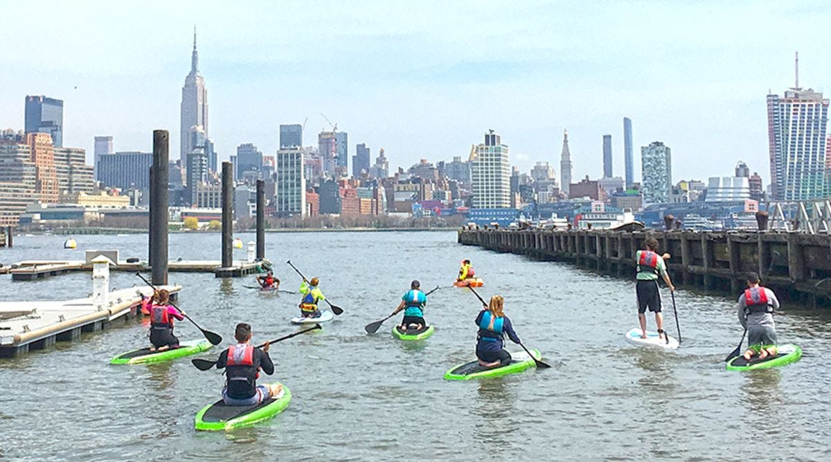 Stevens students paddling in the Hudson River.