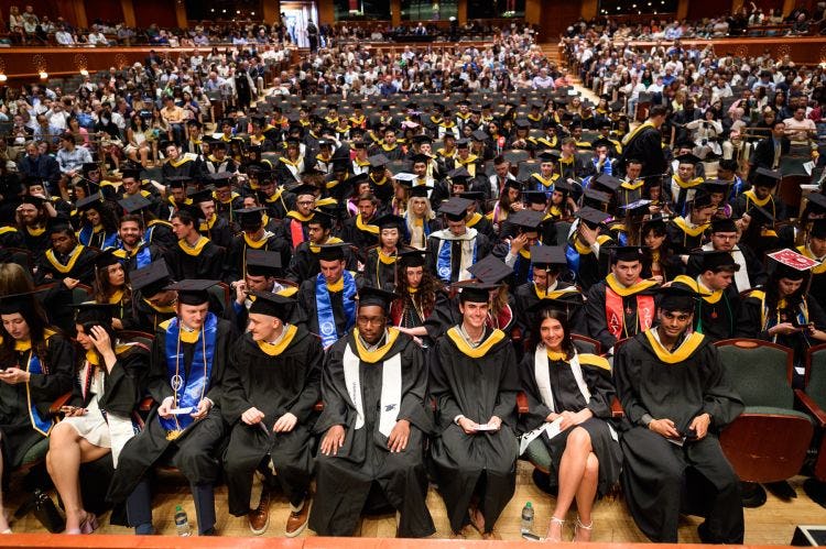 Group of undergraduates before receiving their diplomas