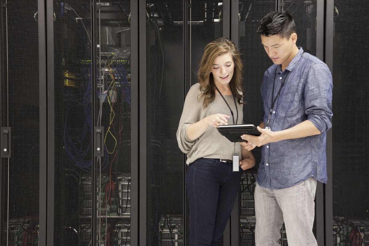 woman and man in a server room
