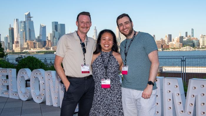 Three alumni enjoy Party with a View on the Babbio patio during Stevens Alumni Weekend
