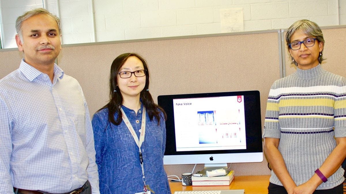 Stevens professor Rajarathnam Chandramouli, Ph.D. student Zongru (Doris) Shao and professor K.P. Subbalakshmi in a lab