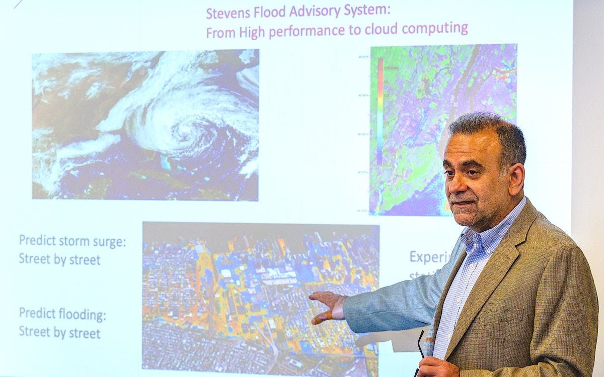 Stevens professor Muhammad Hajj explaining Stevens flood prediction systems