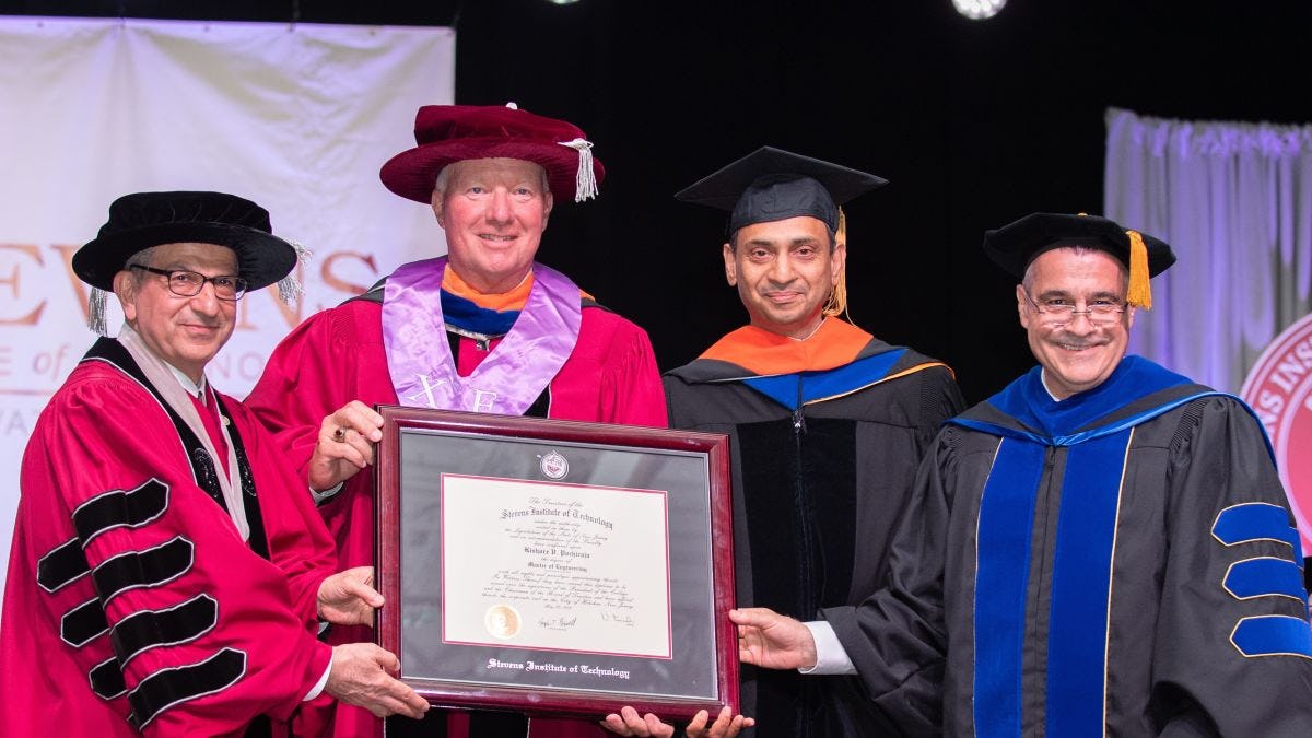 President Nariman Farvardin, Trustees Chairman Stephen T. Boswell, Dr. Kishore Pochiraju and Provost Christophe Pierre at Graduate Commencement