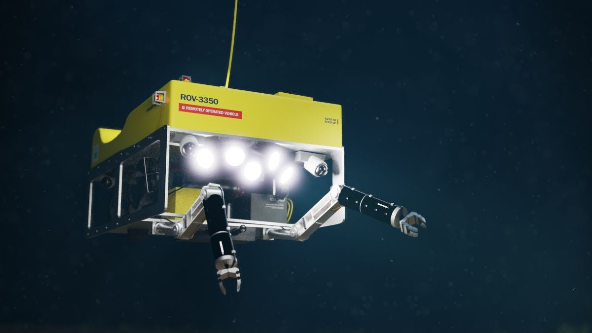 box type robot with lights approaches the ocean floor