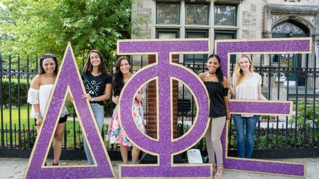 Female Greek Life students with letters