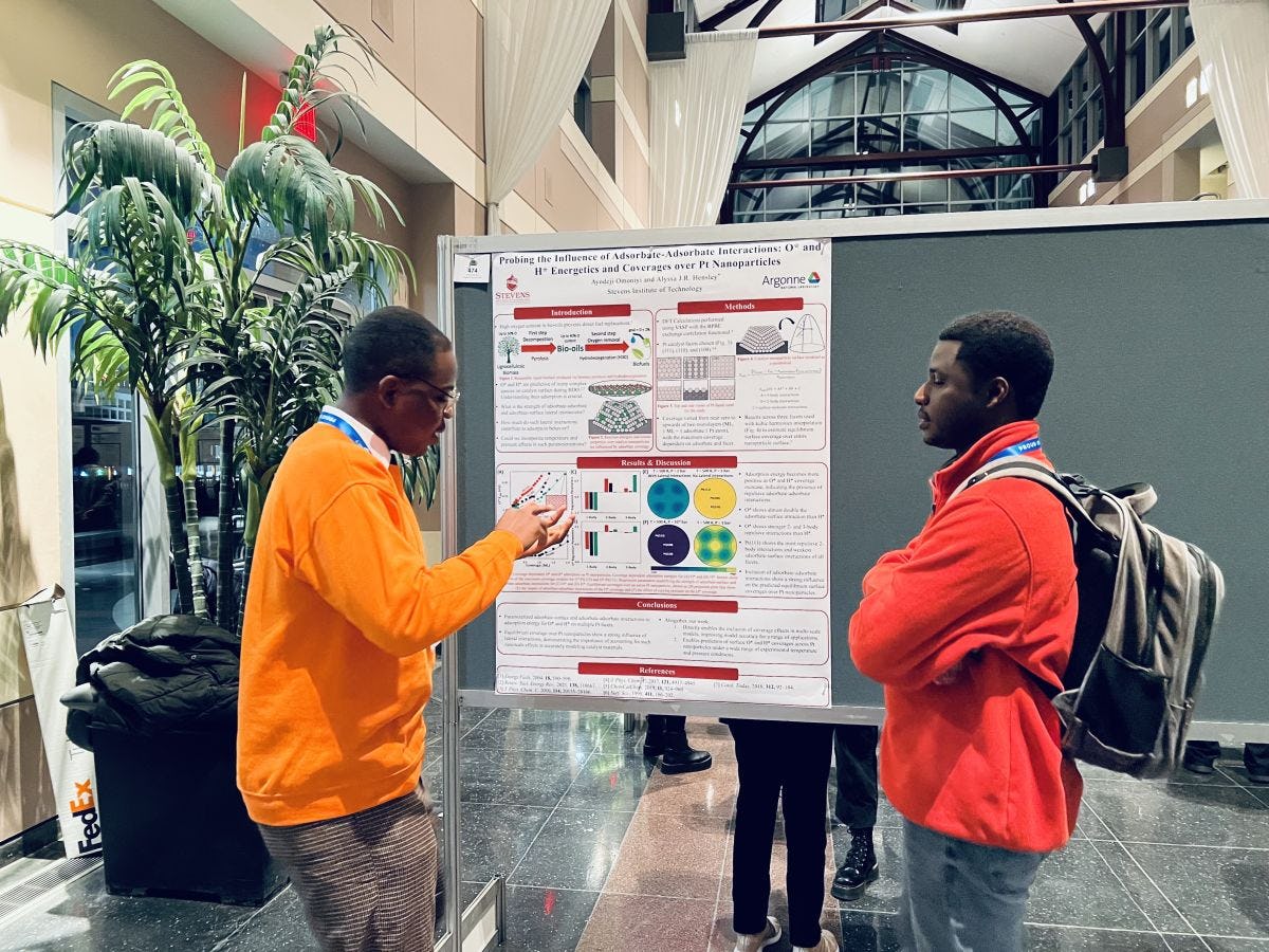 Chemical engineering Ph.D. student Ayodeji Omoniyi gives a poster presentation