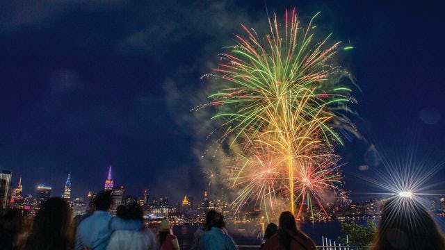 Crowd watches fireworks over the Hudson River