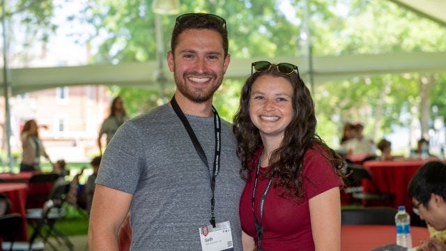 Seth Kirschner smiles at Alumni Weekend on campus
