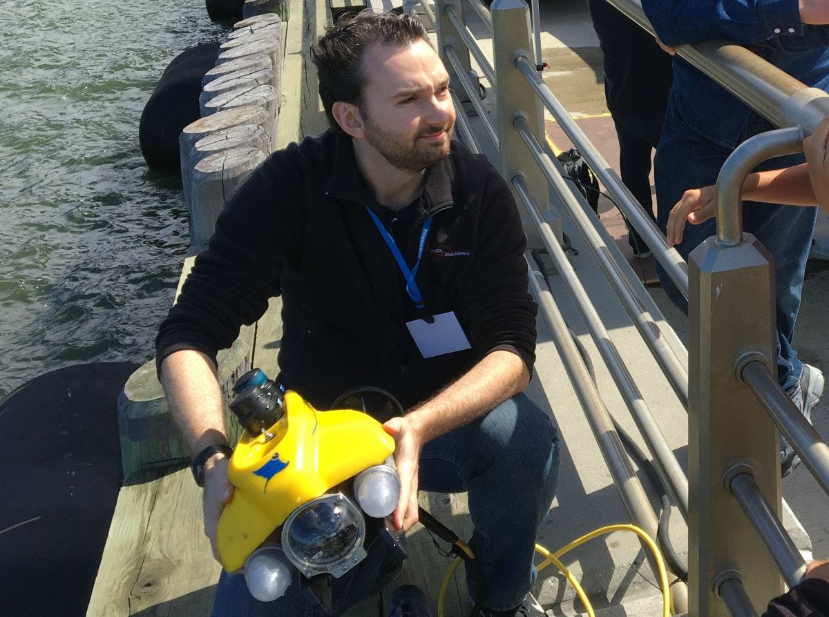 Stevens Professor Brendan Englot testing an underwater robot