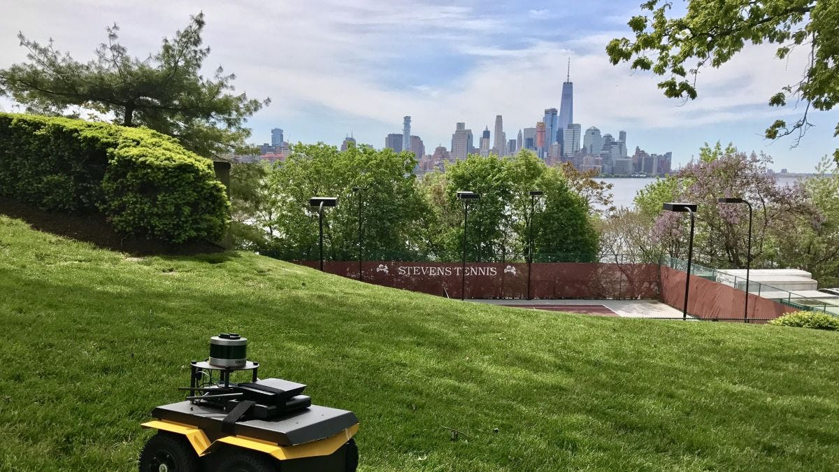 Stevens unmanned robot on top of a campus hill overlooking New York City