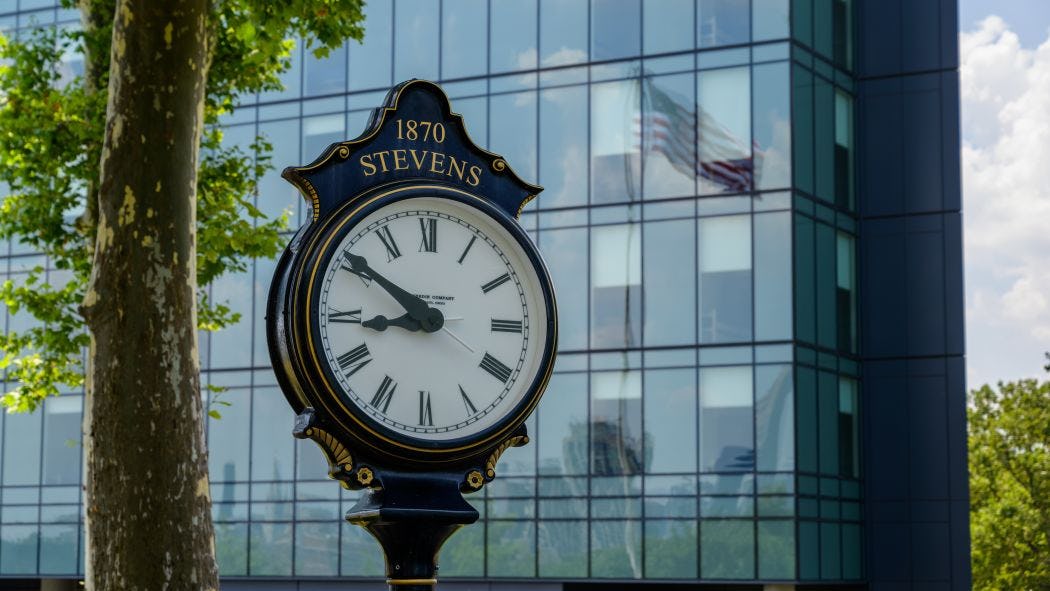 Stevens clock with University Center Complex in the background