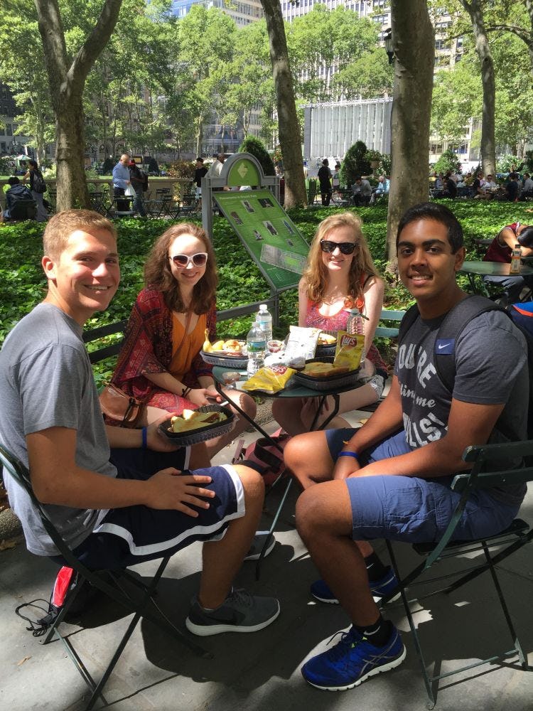 Group of students at Pre-Orientation in NYC while eating lunch