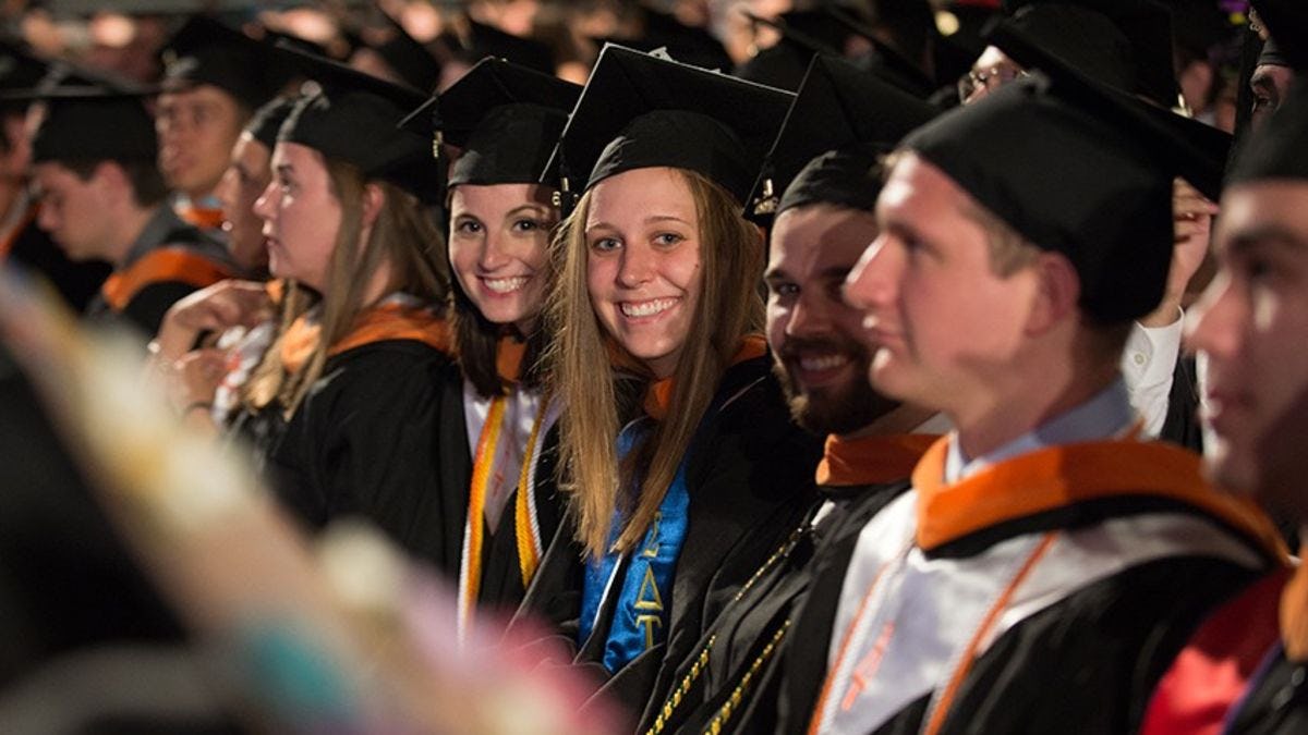 Students celebrate during the 2016 commencement.
