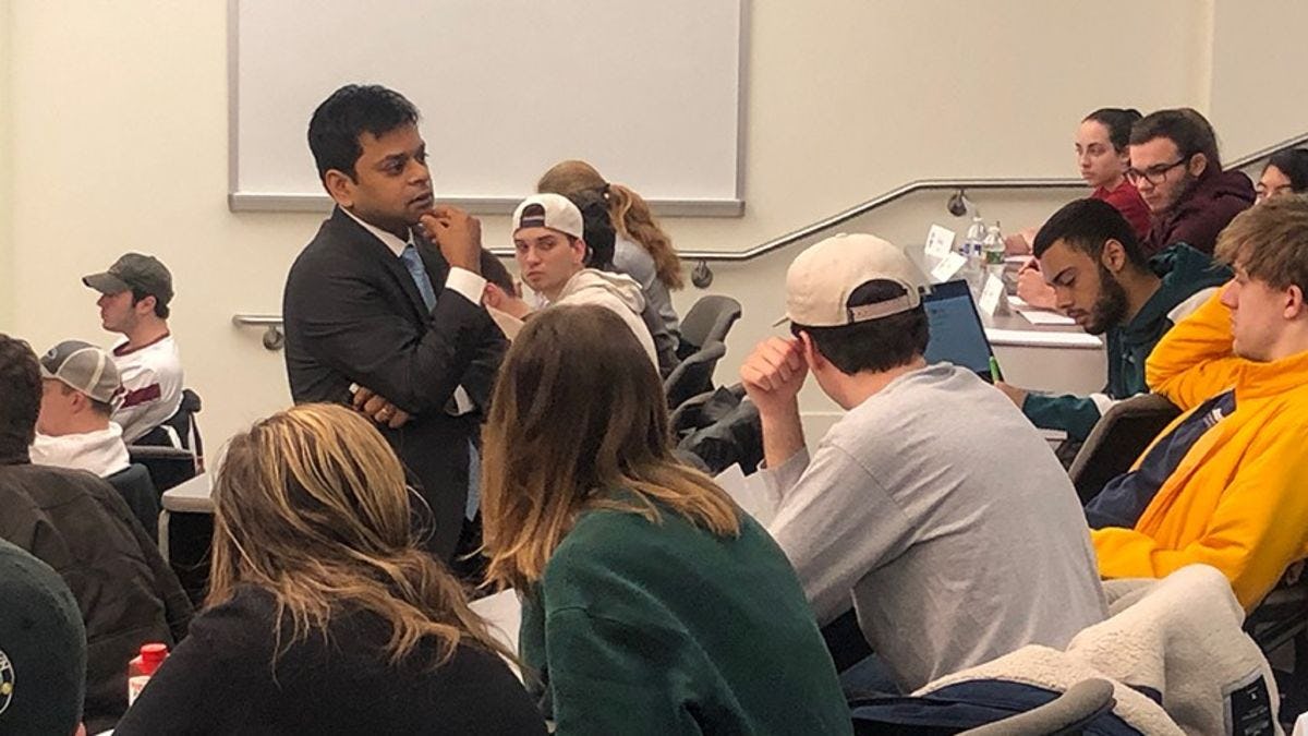 Dr. Pranav Garg leads a classroom discussion with undergraduate students.