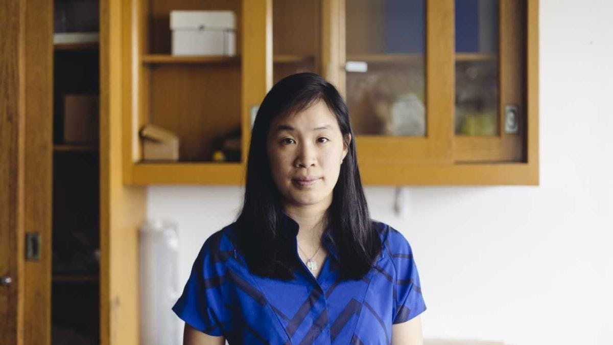 Professor Stephanie Lee sitting in her laboratory