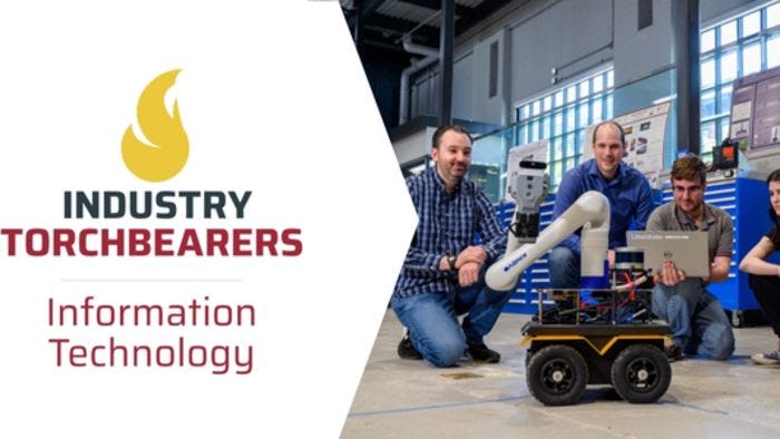 Industry Torchbearers: Industry Technology; four individuals gather around a robot in a Stevens lab