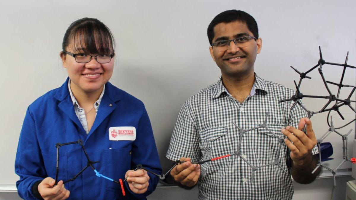 Stevens graduate student Lucia Wang and professor Abhishek Sharma with a model of one of the novel estrogen-receptor (ER) antagonists identified in new research