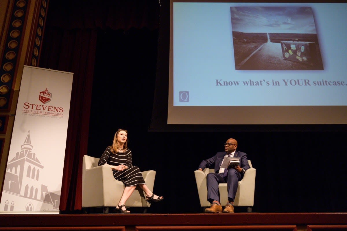 From left to right, Susan Cain and Warren Petty, both seated and on stage at DeBaun Auditorium participating in a Q and A