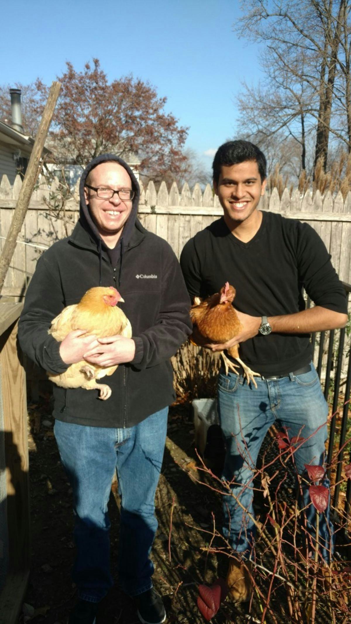 John McKenna and Ravi Shah, holding some of Professor Fontaine's chickens