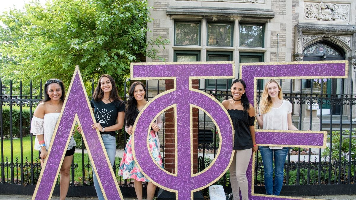 Delta Phi Epsilon puts their letters on display.