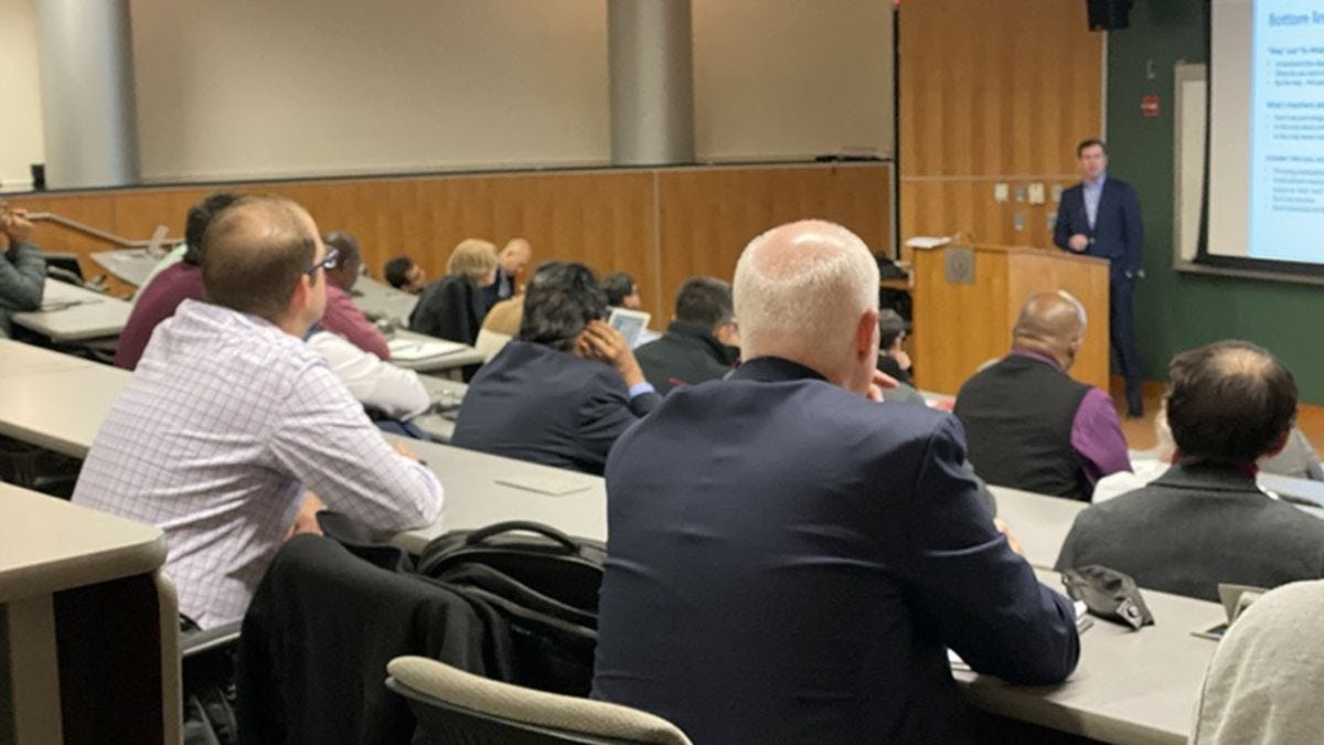 Photo of Tom Doughty from Prudential Financial presenting in a lecture hall during FinCyberSec2019.