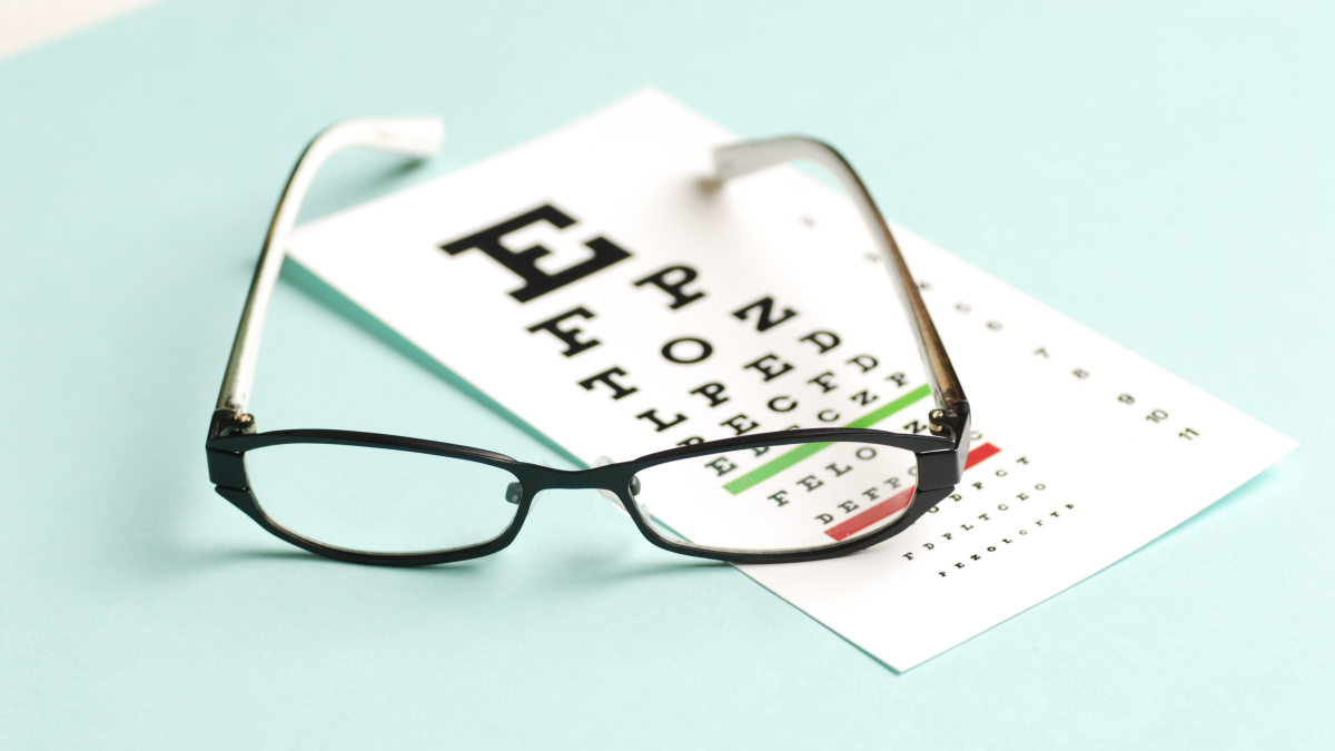 photo of glasses and eye exam chart