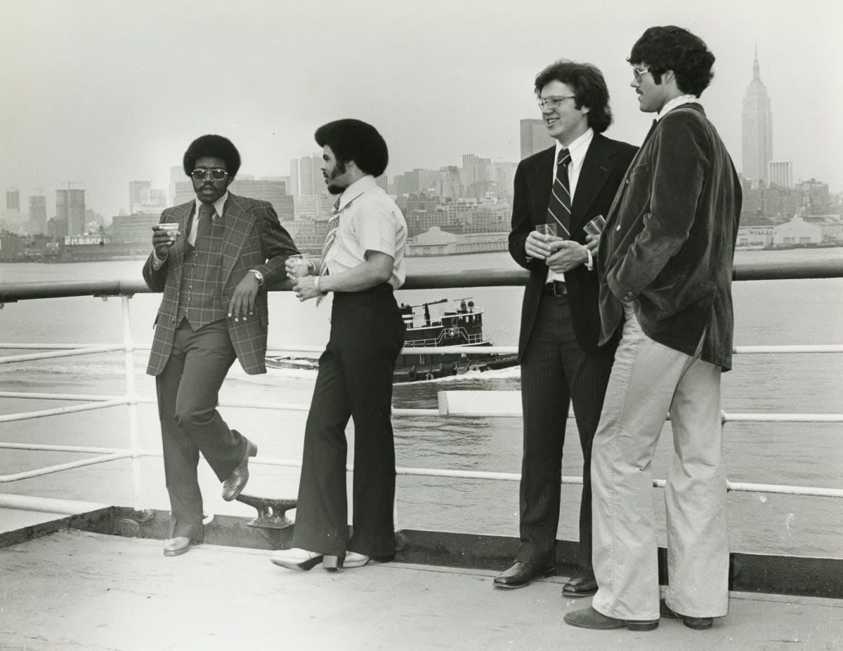 Students celebrating Commencement Weekend on the ship's deck in 1975